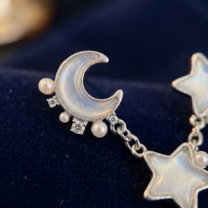 bijoux-2370-macro-1.jpg Boucles lune étoile perles - Design délicat